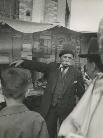 Newspaper sellers in Paris