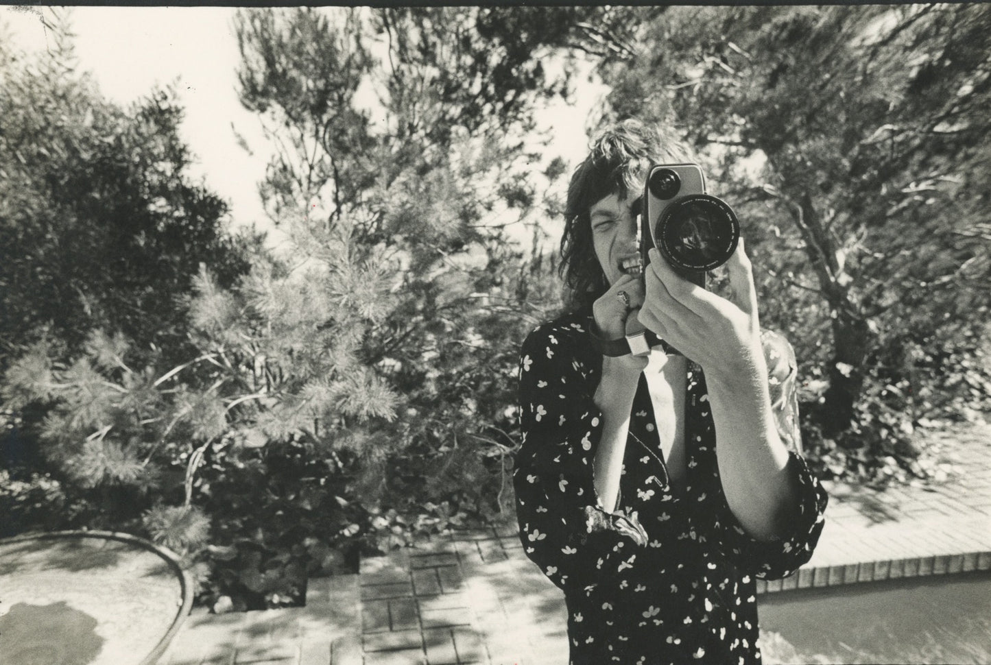 Mick Jagger taking a photo by Ethan Allen Russell